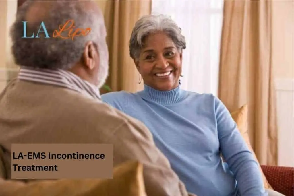 Couple sat smiling at each other - LA-EMS treatment Lutterworth