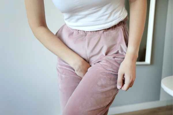 woman running for the toilet because of urinary incontinence Lutterworth